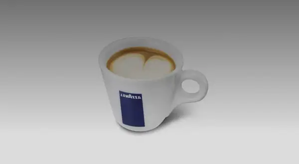 Tazza Lavazza con schiuma di latte a forma di cuore, perfetta per illustrare la differenza tra cappuccino e caffè macchiato.